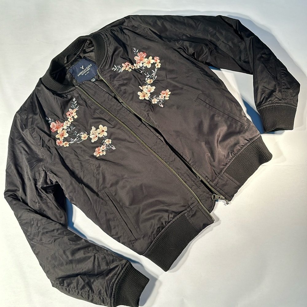 American eagle jacket. Floral embroidered in the front. Excellent for spring